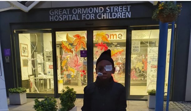 Nathaniel outside Great Ormond Street Hospital for Children