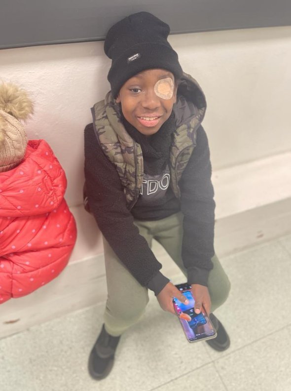 Nathaniel with his phone