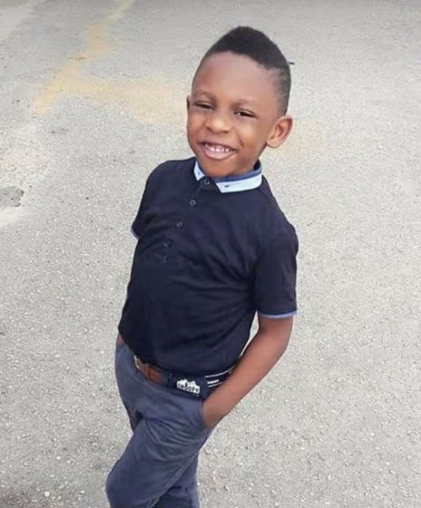 Nathaniel smiling outdoors